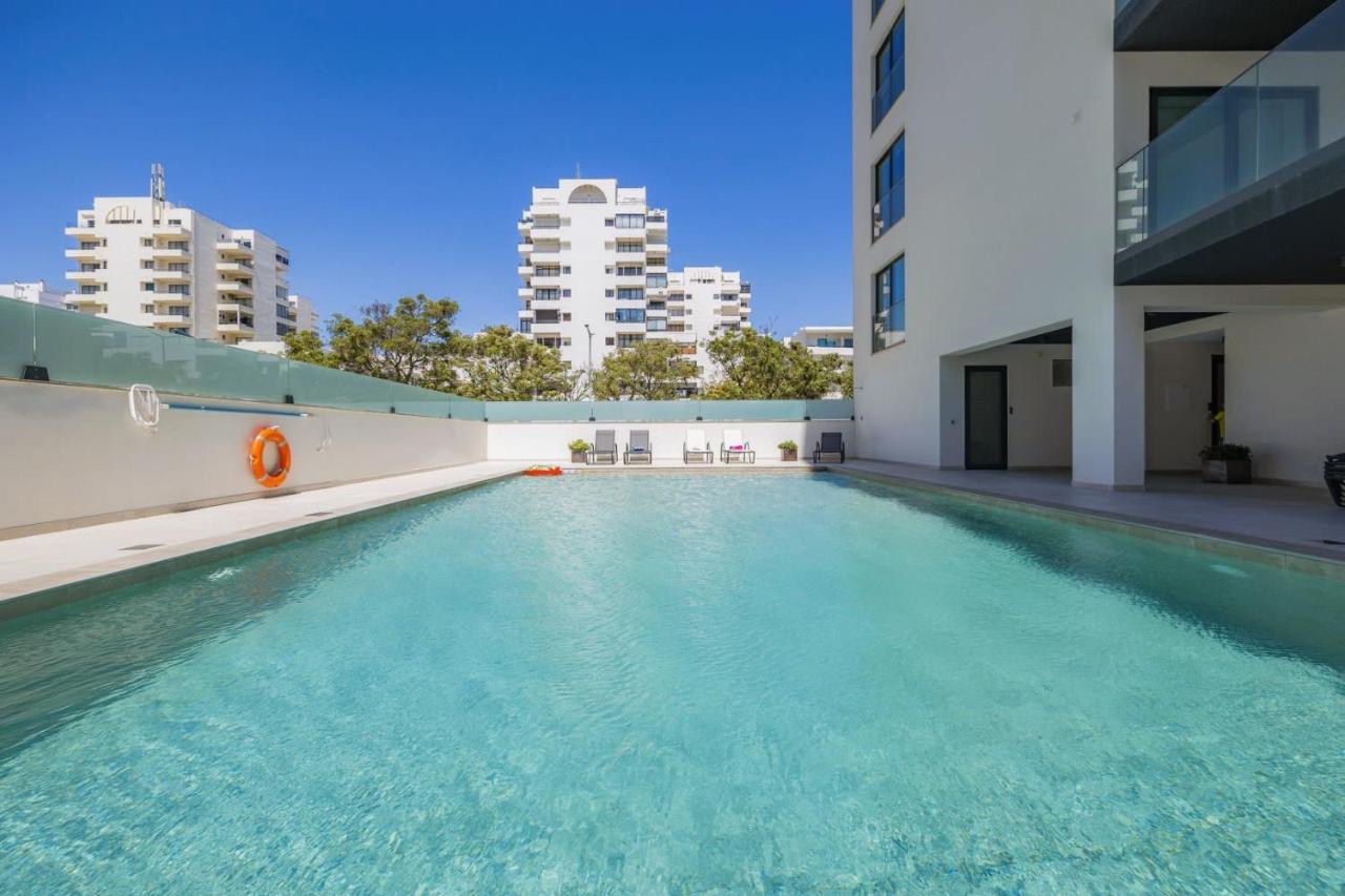 Stylish Modern Beachside Apartment With Pool & Seaview Quarteira Ngoại thất bức ảnh